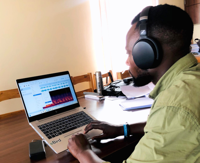 Lead Recordist Mbonigaba Jean de Dieu Remy works on audio processing